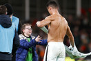 Ronaldo gives young fan the shirt off his back after she runs onto pitch