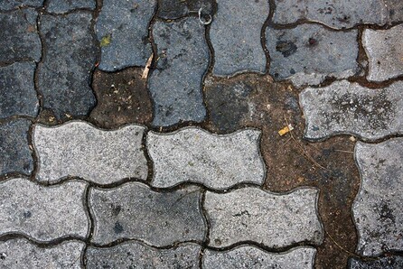 Under the paving stones, the river 