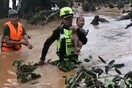 Η συγκινητική διάσωση βρέφους από πλημμυρισμένη καλύβα στο Λάος (ΒΙΝΤΕΟ)