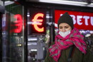 Isolated Russians scramble for hard currency, fear worse is yet to come