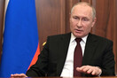 Putin formally signs law on punishing "fake information" - Tass