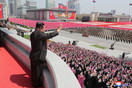 North Korea marks founder Kim Il-sung’s birthday with mass parade but no weapons