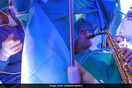 Patient plays saxophone while undergoing brain surgery in Italy