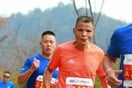 Chinese man 'runs marathon in just three and a half hours despite CHAIN SMOKING for the entire 42 kilometres'