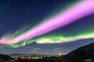 Solar Storm Causes Neon-Pink Northern Lights To Fill the Sky