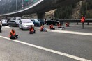 Ελβετία: Ακτιβιστές για το κλίμα απέκλεισαν κεντρικό δρόμο - Κόλλησαν στο οδόστρωμα