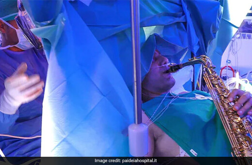 Patient plays saxophone while undergoing brain surgery in Italy
