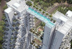 Δύο ουρανοξύστες ενωμένοι με μια πισίνα