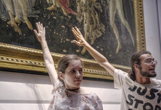 Climate activists in Italy glue themselves to Botticelli painting