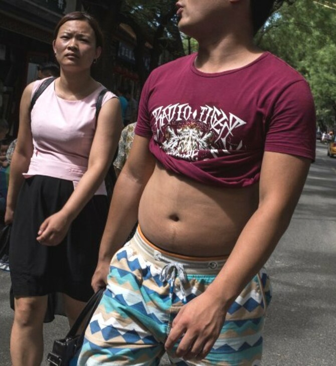 Τέλος το «μπικίνι του Πεκίνου» σε πόλη της Κίνας - Πρόστιμο για όσους αφήνουν την κοιλιά τους ακάλυπτη
