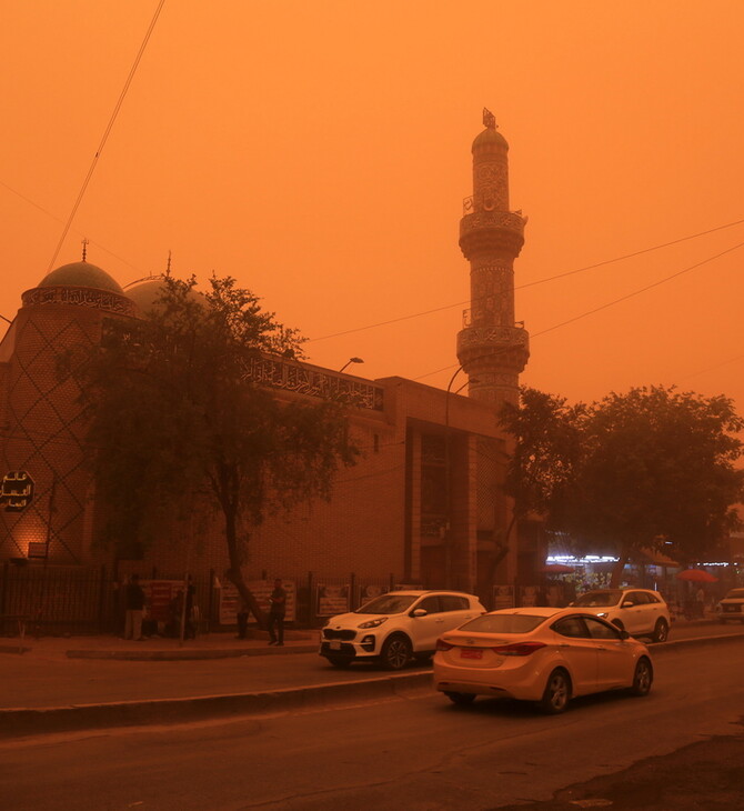Απόκοσμες εικόνες στο Ιράκ- Καταιγίδα σκόνης έκανε τον ουρανό πορτοκαλί 