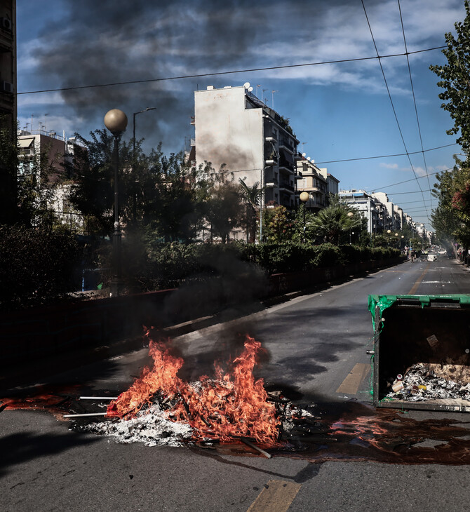 Επεισόδια στην Πατησίων έξω από την ΑΣΟΕΕ – Έβαλαν φωτιά σε κάδο