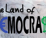 "The Land of D€MOCRA$¥"