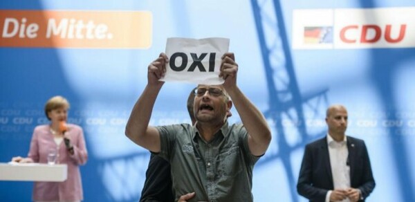 Ακτιβιστές διέκοψαν ομιλία της Μέρκελ στο Βερολίνο
