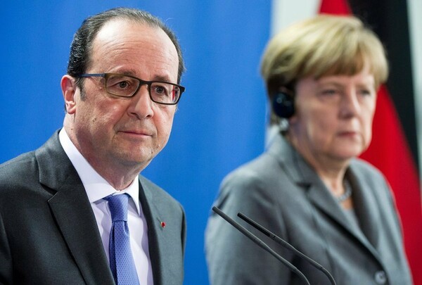 Le Monde: Η ελληνική κρίση θέτει σε δοκιμασία το γαλλο-γερμανικό ντουέτο