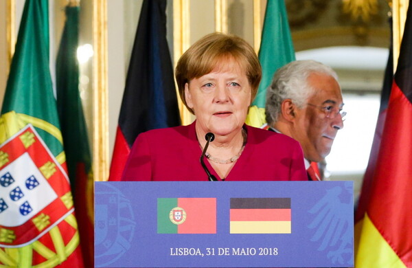 Μέρκελ: Η ΕΕ θα απαντήσει με αποφασιστικό και ενιαίο τρόπο στους δασμούς των ΗΠΑ
