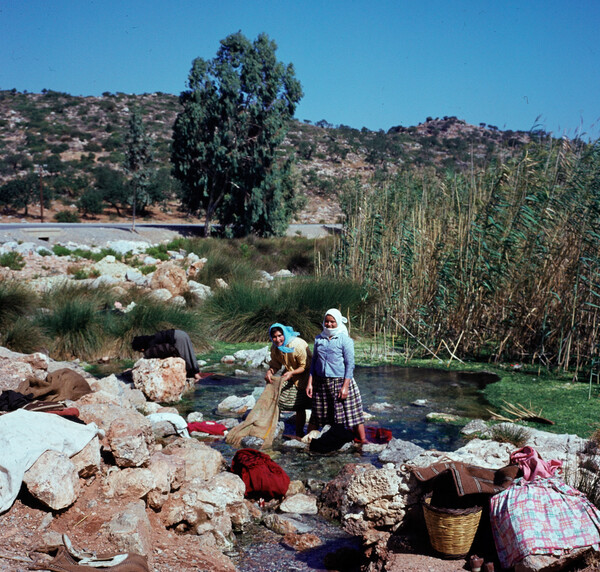 washing clothes river