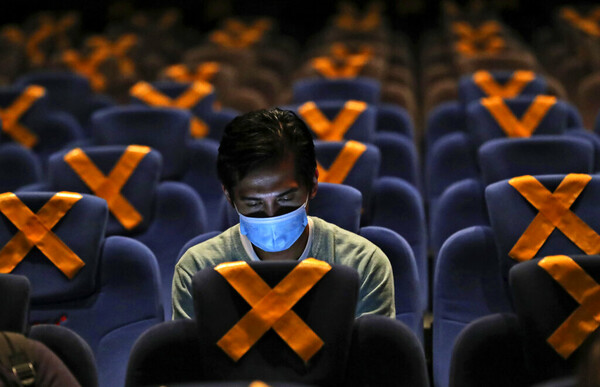 How safe is the cinema? Experts analyse Covid risks as No Time to Die opens