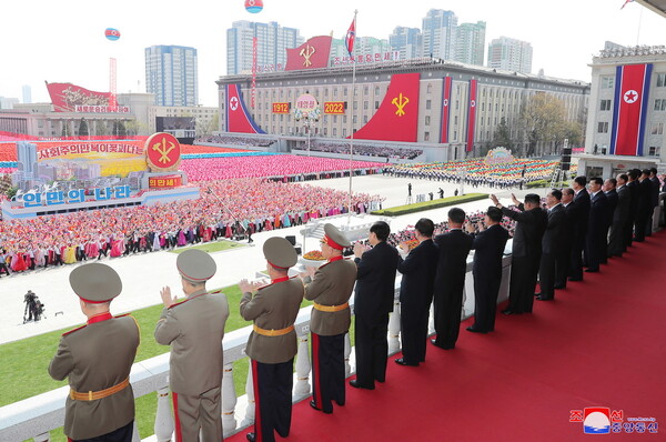North Korea marks founder Kim Il-sung’s birthday with mass parade but no weapons