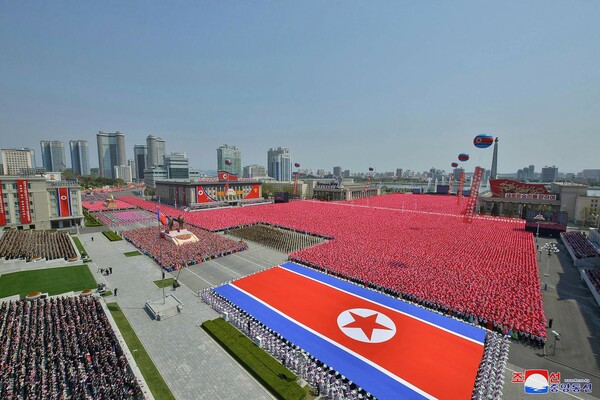 North Korea marks founder Kim Il-sung’s birthday with mass parade but no weapons