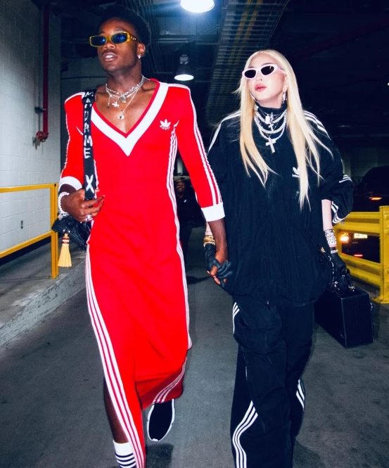 Madonna’s son David Banda wears sporty red dress during night out with mom