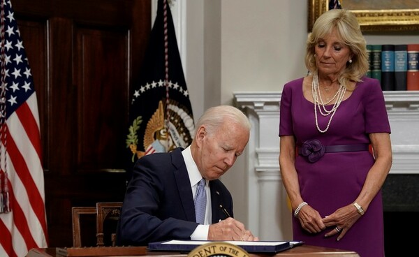 Biden signs bipartisan gun safety bill into law; takes swipe at Supreme Court