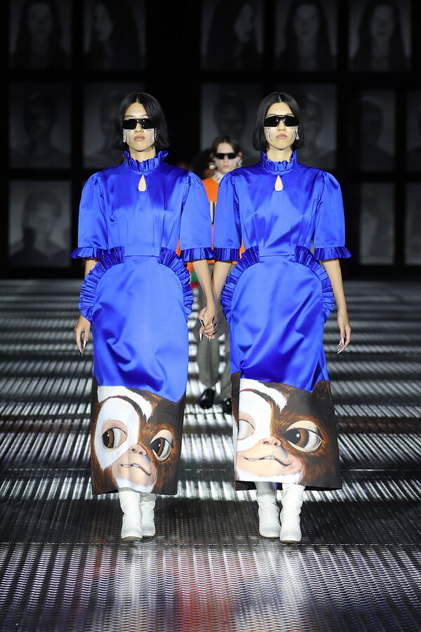 Gucci dresses 68 identical twins in matching finery at Milan