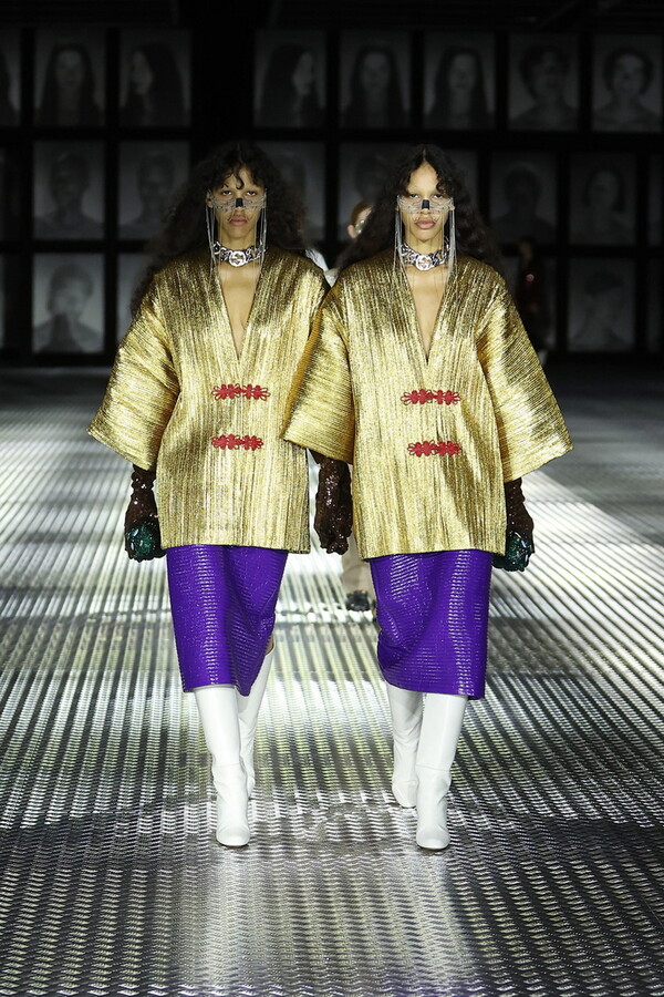 Gucci dresses 68 identical twins in matching finery at Milan