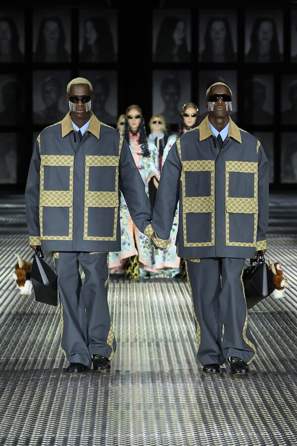 Gucci dresses 68 identical twins in matching finery at Milan