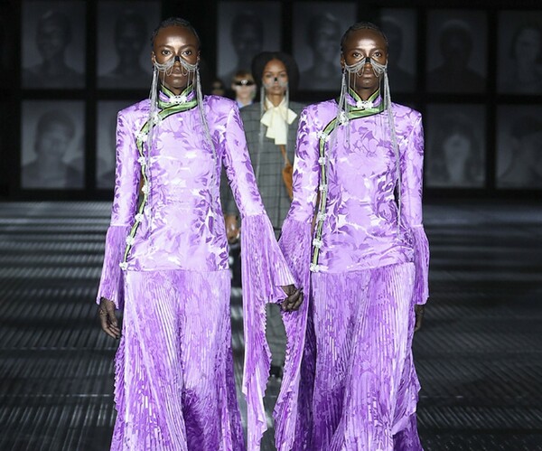 Gucci dresses 68 identical twins in matching finery at Milan