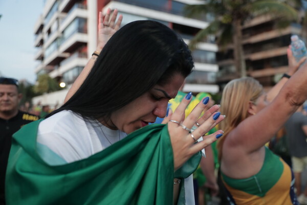 Bolsonaro voters pray as rival Lula wins Brazil presidential runoff