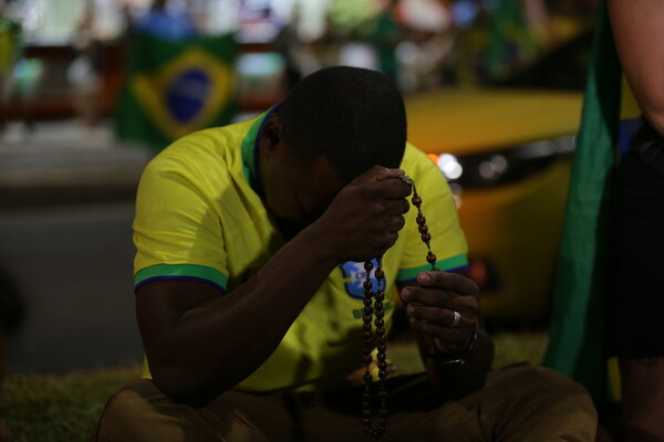 Bolsonaro voters pray as rival Lula wins Brazil presidential runoff