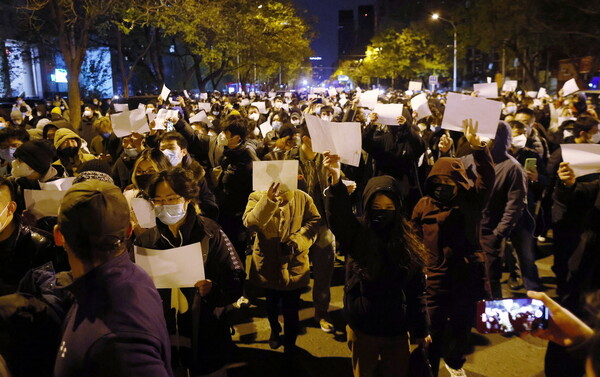 Blank sheets of paper become symbol of defiance in China protests