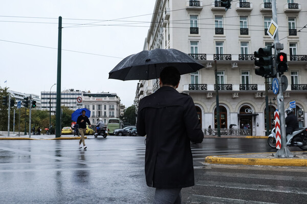 Άνδρας με ομπρέλα