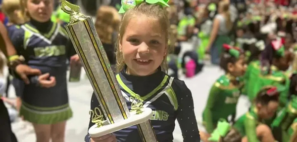 Florida 8-year-old wins cheer competition after team no-shows, performs solo