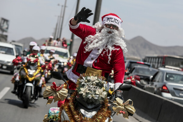 Midnight Mass and surfing Santas: Pictures of Christmas around the world
