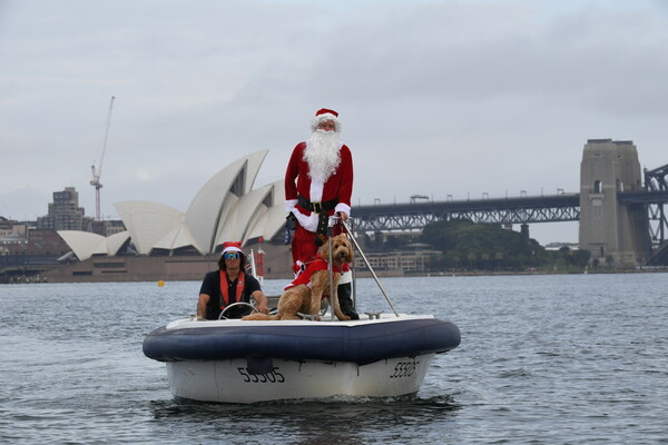 Midnight Mass and surfing Santas: Pictures of Christmas around the world