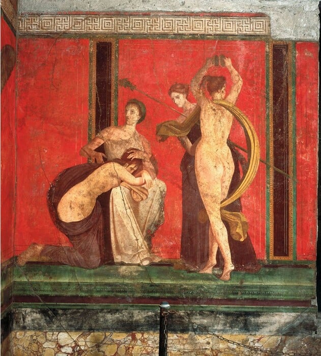 Στην Πομπηία, ένας κόκκινος τοίχος ξαναφέρνει στο φως τα μυστήρια του Διονύσου