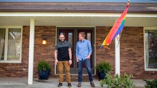 Gay couple in Wisconsin bypass flag rules with rainbow floodlights