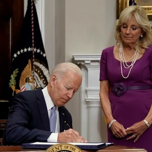 Biden signs bipartisan gun safety bill into law; takes swipe at Supreme Court